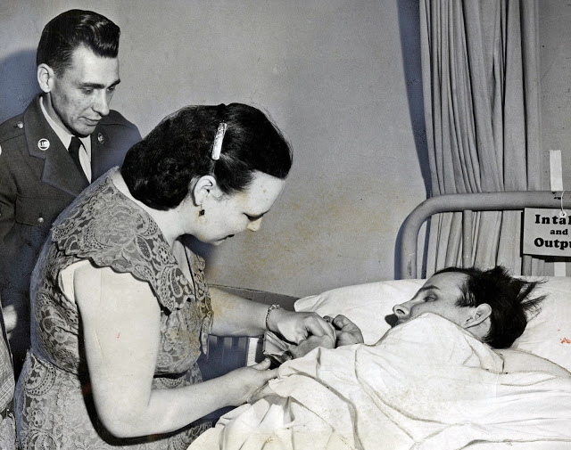 Bernard J Mainer in hospital bed